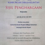 Sijil penghargaan kepada Air Kelantan Sdn Bhd atas kesudian melantik Klinik Projek DiRaja Kelantan sebagai Klinik Panel. 